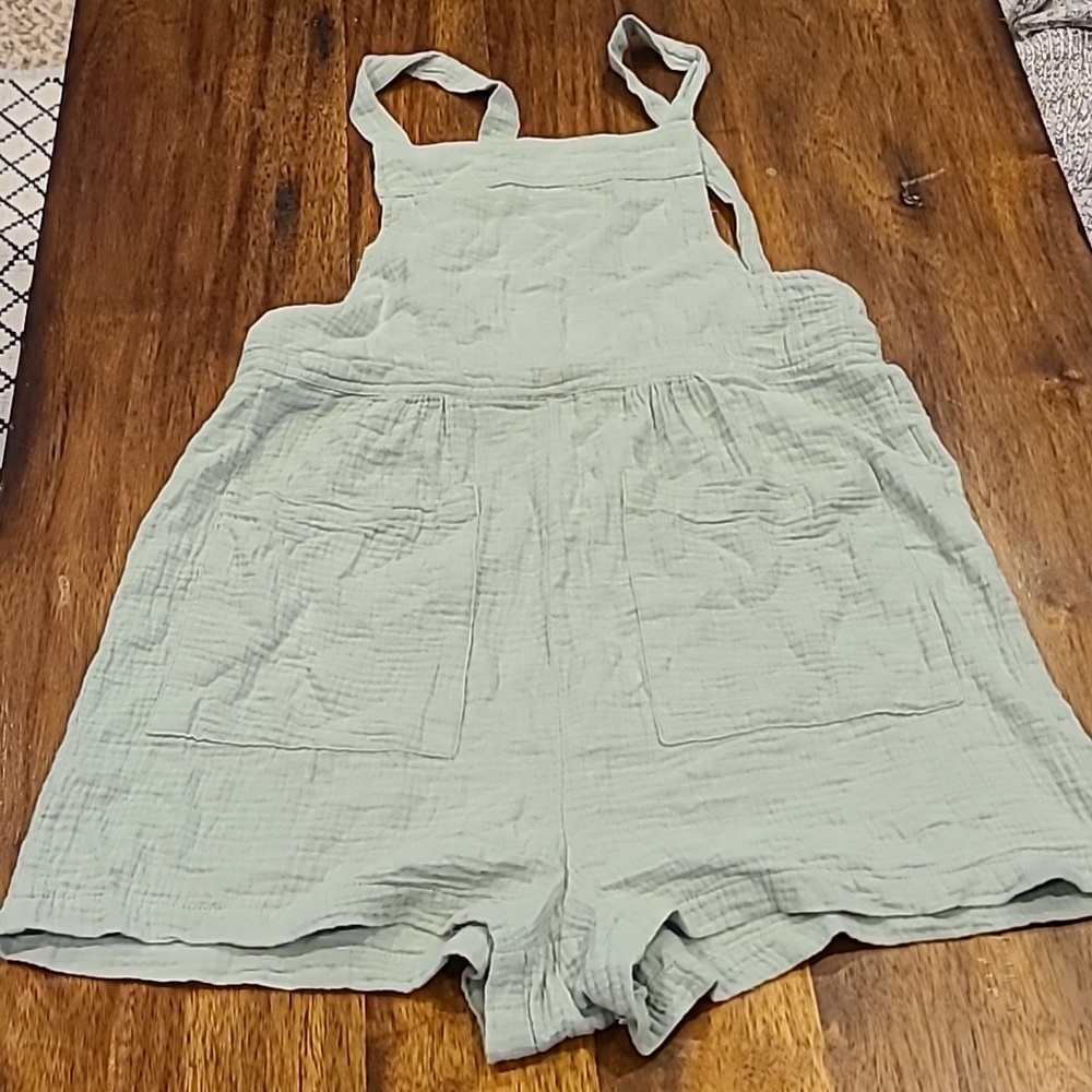 New IN romper Size Small. New